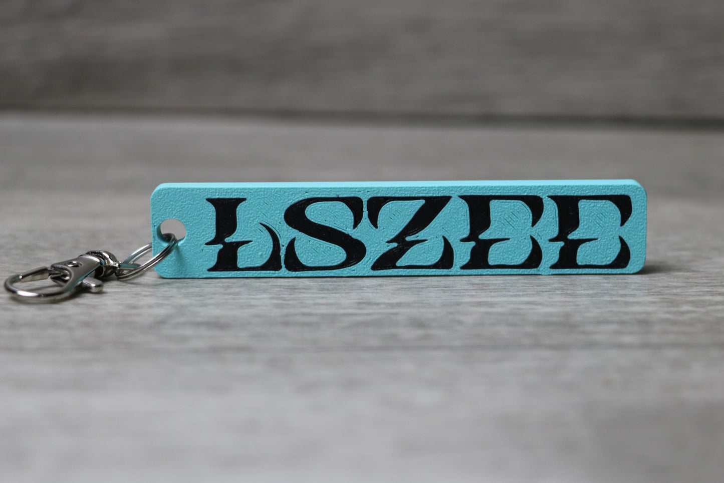 LSZEE Keychain – EDM Rave Charm for Festival Bags, Basshead DJ Fan Gift, Cute LSZEE Merch Collectible for Headbangers